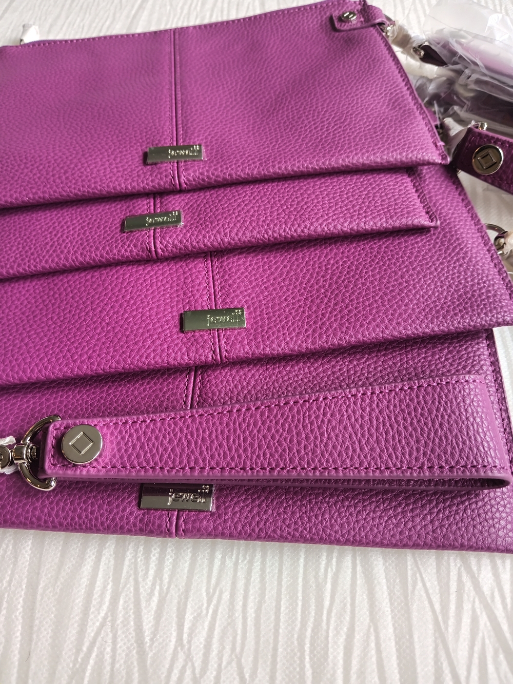 1 Pebbled Leather Wristlet Clutch in Fuchsia by Jewell
